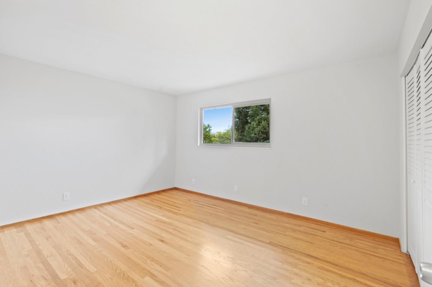 155 Belhaven Drive Los Gatos, CA 95032 - Photo 24 of 30 a view of empty room with wooden floor
