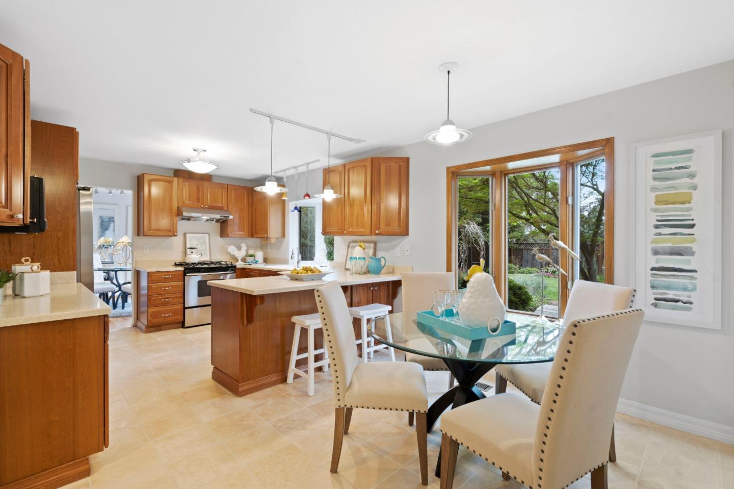 155 Belhaven Drive Los Gatos, CA 95032 - Photo 10 of 30 a dining room with furniture a chandelier and window