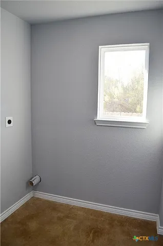 a view of small space with racks on the wall