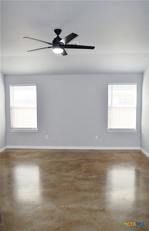 745 Freedom Circle Nolanville, TX 76559 - Photo 15 of 38 a view of an empty room with wooden floor and a window