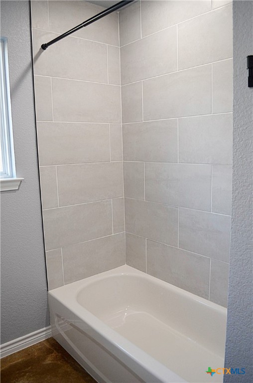 745 Freedom Circle Nolanville, TX 76559 - Photo 27 of 38 a bathroom with a shower and a bath tub