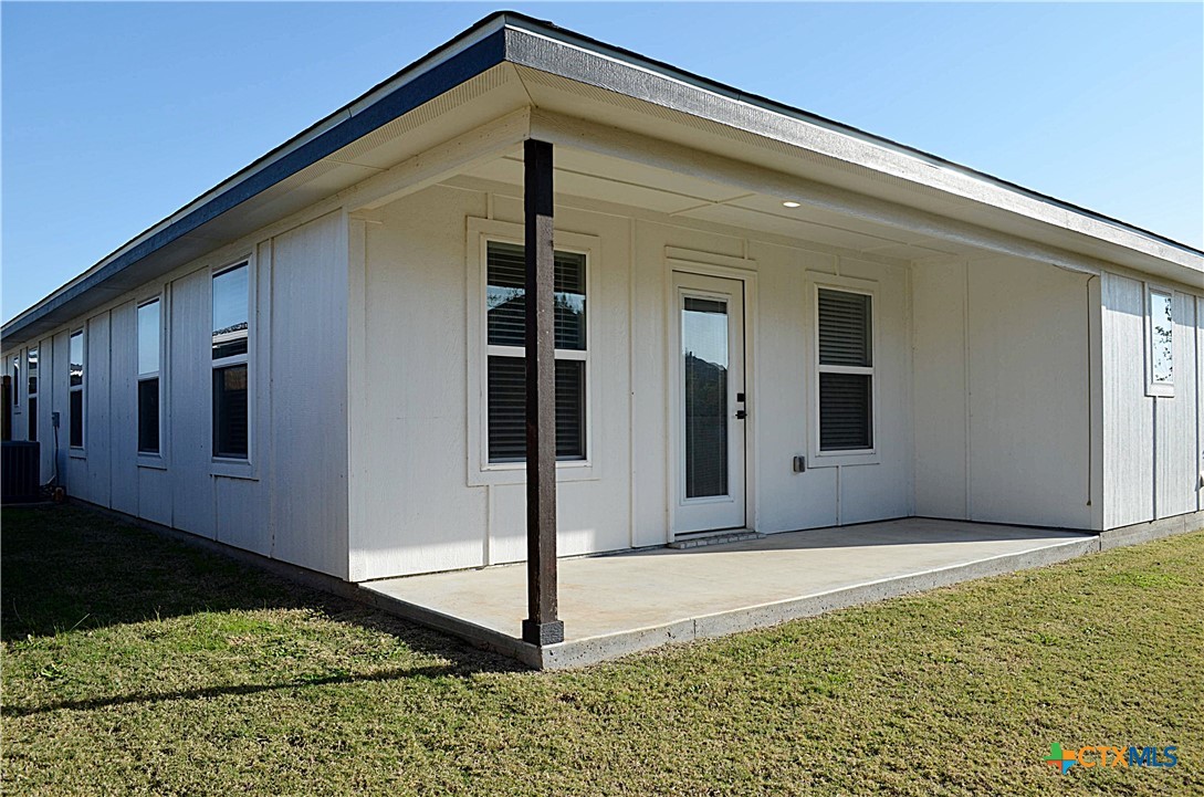 745 Freedom Circle Nolanville, TX 76559 - Photo 37 of 38 a front view of a house with porch