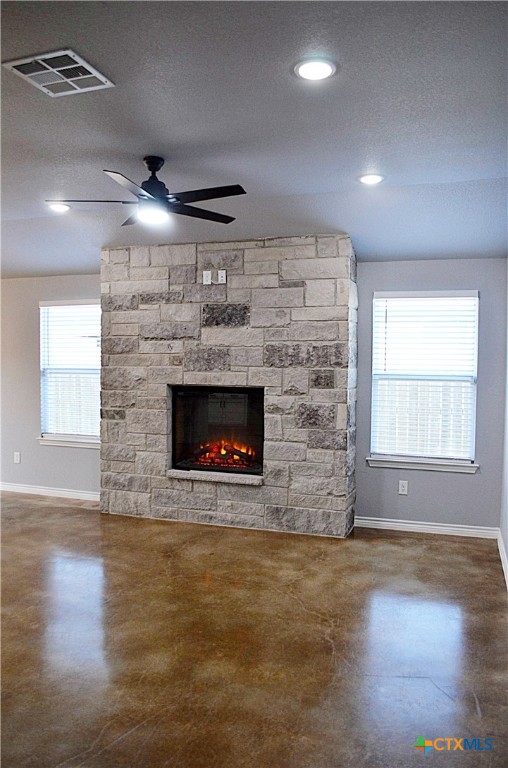 745 Freedom Circle Nolanville, TX 76559 - Photo 5 of 38 an empty room with windows and fireplace