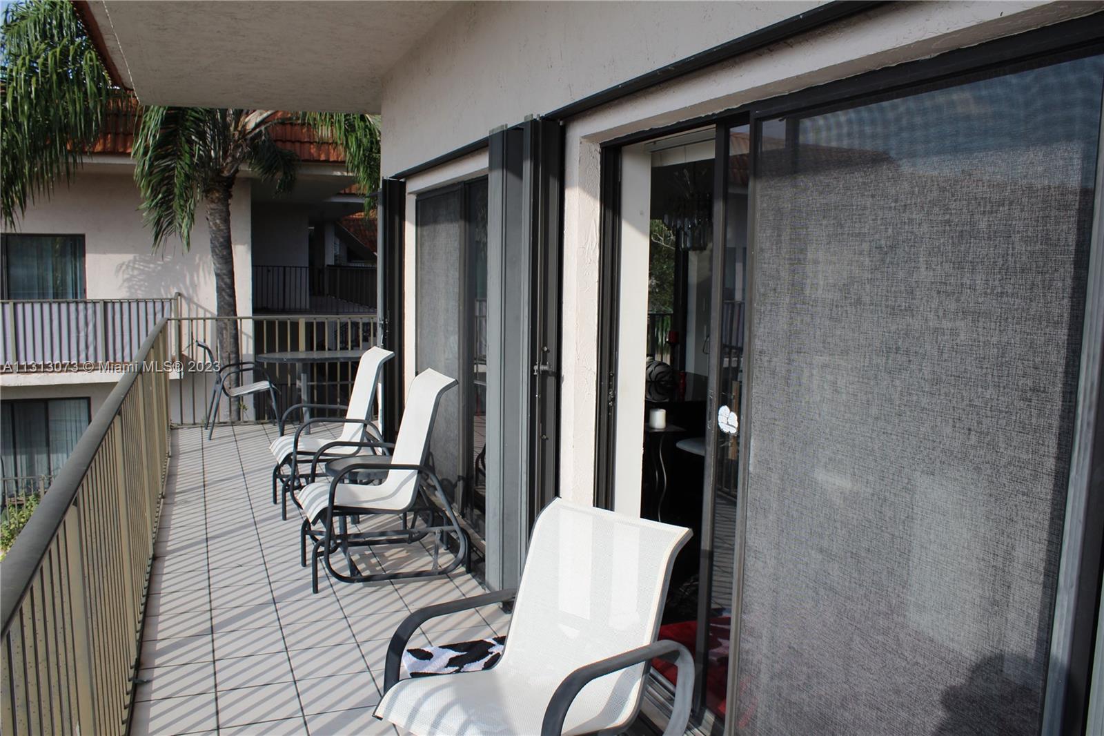 4730 Southwest 62nd Way, Unit 301 Davie, FL 33314 - Photo 13 of 33 a view of balcony and patio