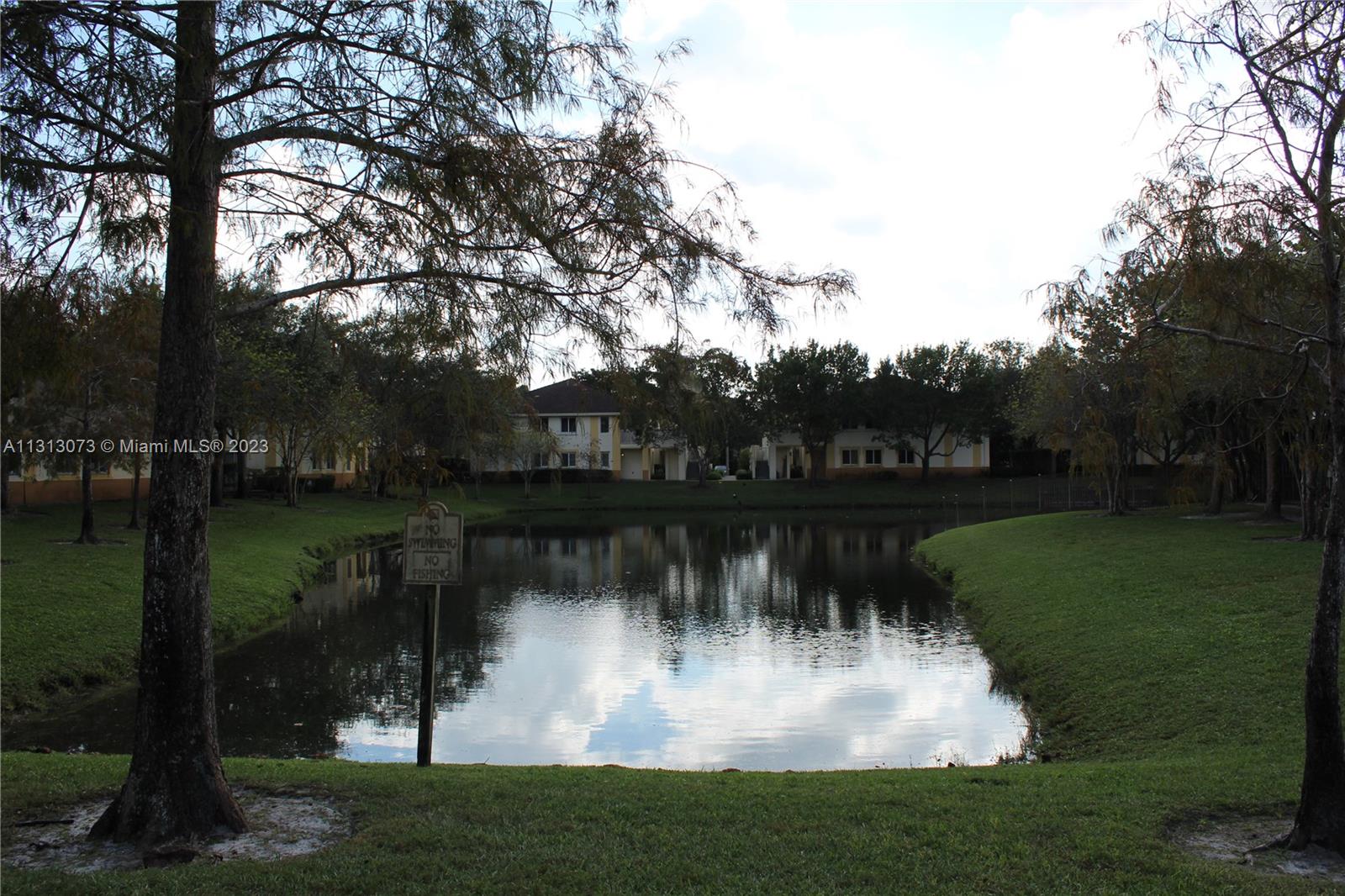 4730 Southwest 62nd Way, Unit 301 Davie, FL 33314 - Photo 18 of 33 a view of a lake view