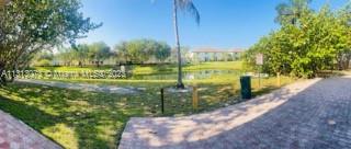 4730 Southwest 62nd Way, Unit 301 Davie, FL 33314 - Photo 30 of 33 a view of a back yard
