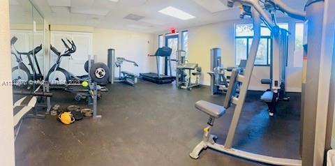 4730 Southwest 62nd Way, Unit 301 Davie, FL 33314 - Photo 31 of 33 a view of a room with gym equipment