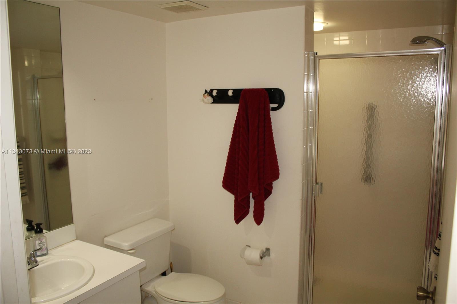 4730 Southwest 62nd Way, Unit 301 Davie, FL 33314 - Photo 8 of 33 a bathroom with a shower and a sink