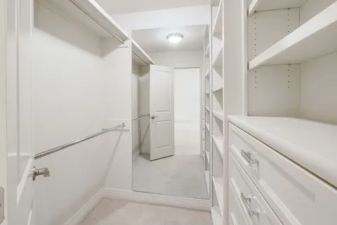 a bathroom with a tub and shower