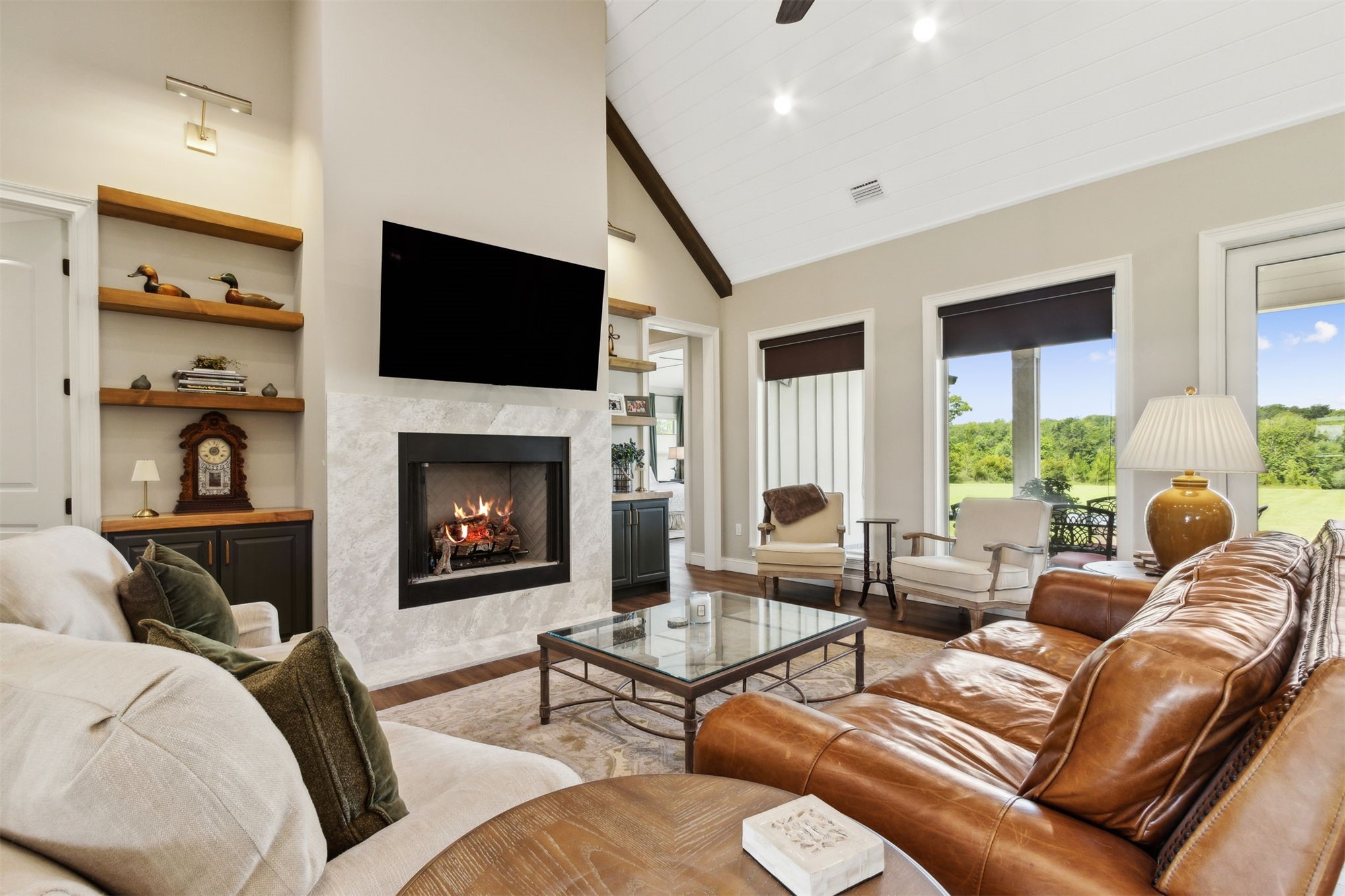 37854 Kings Ferry Road Hilliard, FL 32046 - Photo 19 of 52 a living room with furniture fireplace and flat screen tv