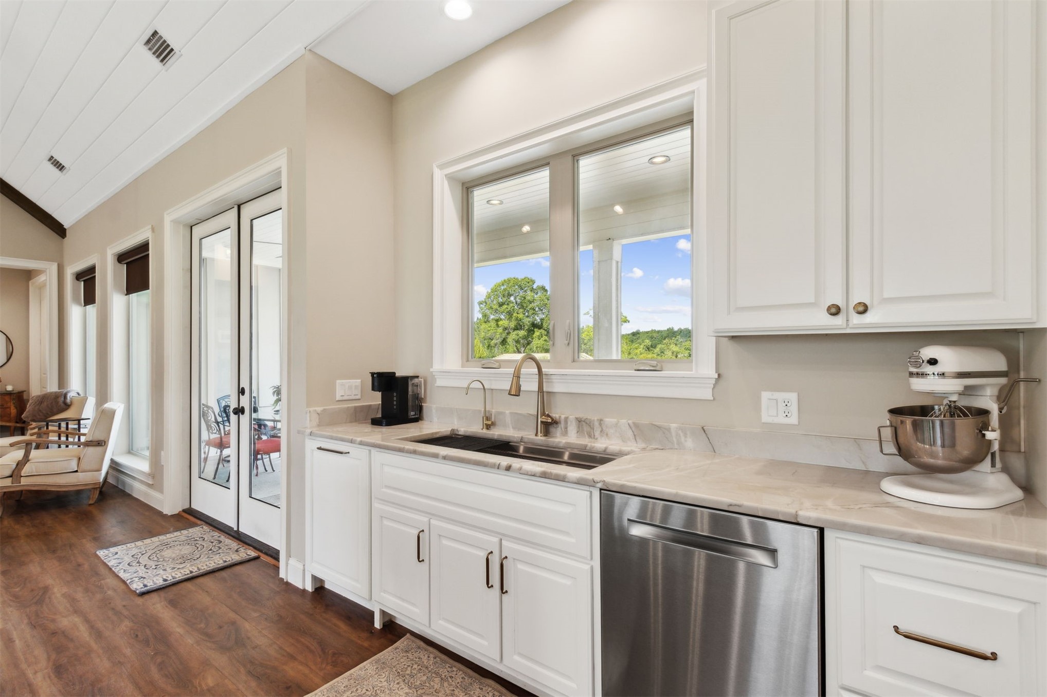 37854 Kings Ferry Road Hilliard, FL 32046 - Photo 25 of 52 a kitchen with stainless steel appliances granite countertop a sink stove and cabinets