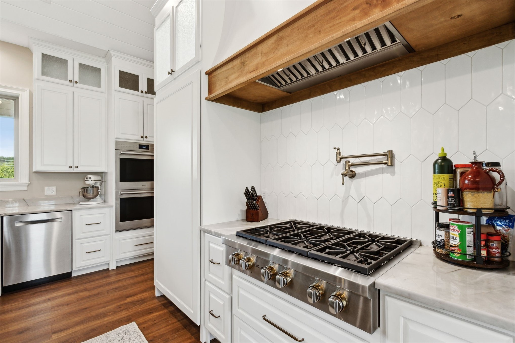 37854 Kings Ferry Road Hilliard, FL 32046 - Photo 26 of 52 a kitchen with cabinets and appliances