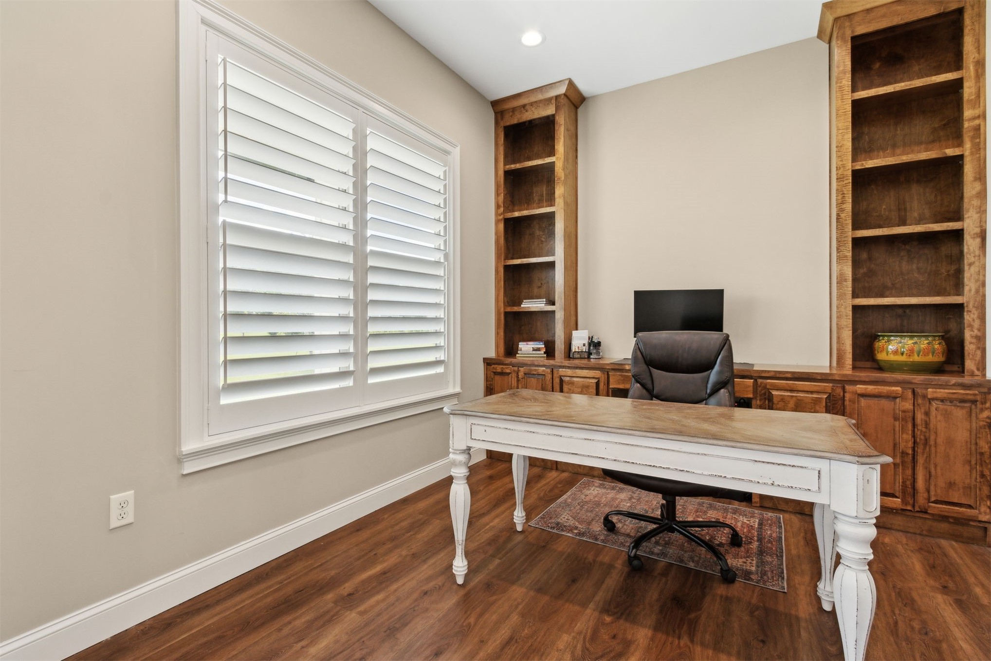 37854 Kings Ferry Road Hilliard, FL 32046 - Photo 27 of 52 a view of a workspace with furniture and a window