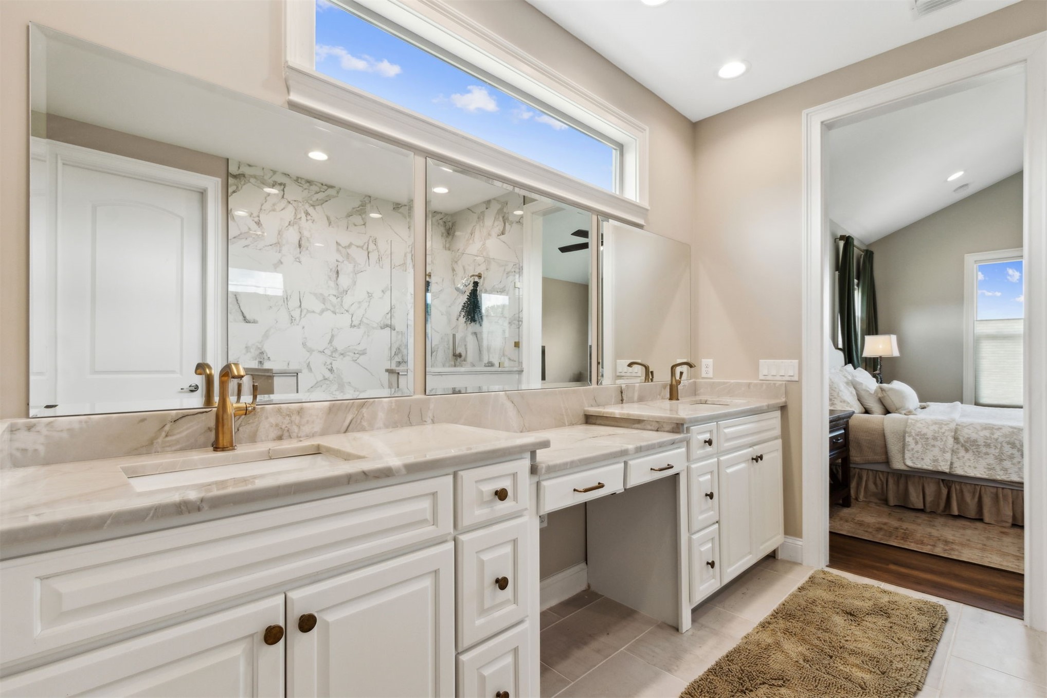 37854 Kings Ferry Road Hilliard, FL 32046 - Photo 32 of 52 a bathroom with a double vanity sink mirror and double