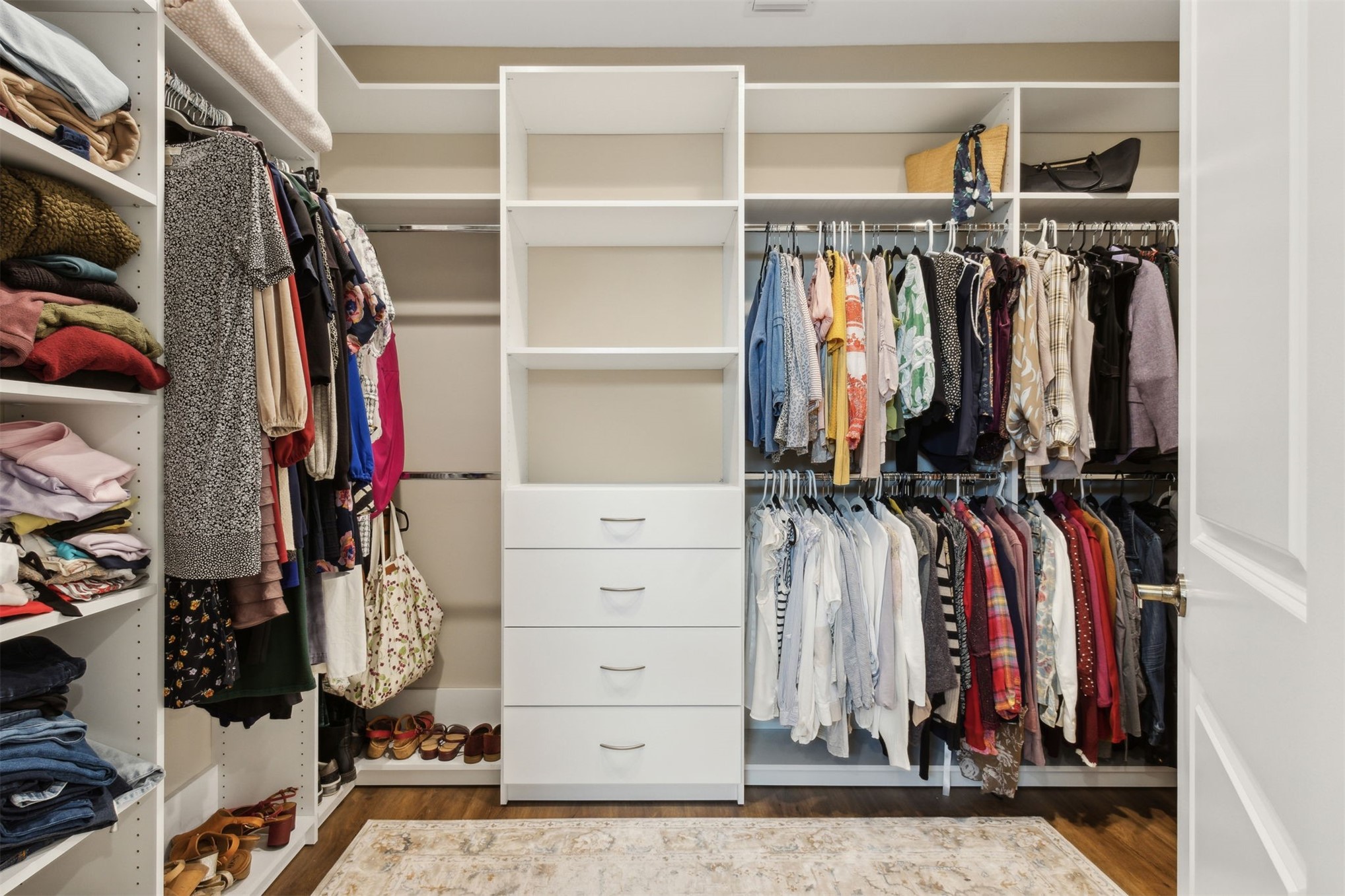 37854 Kings Ferry Road Hilliard, FL 32046 - Photo 34 of 52 a view of walk in closet with clothes