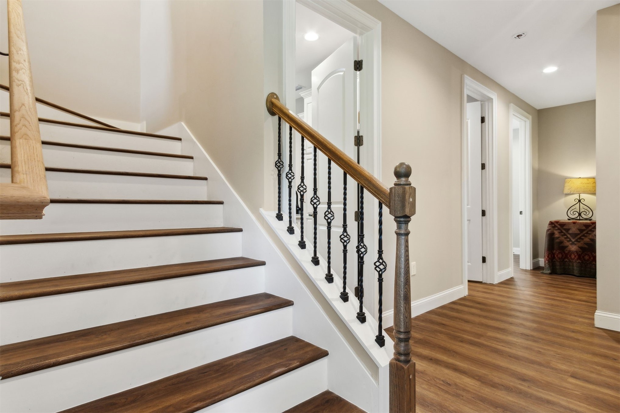37854 Kings Ferry Road Hilliard, FL 32046 - Photo 40 of 52 a view of a hallway with wooden floor and staircase