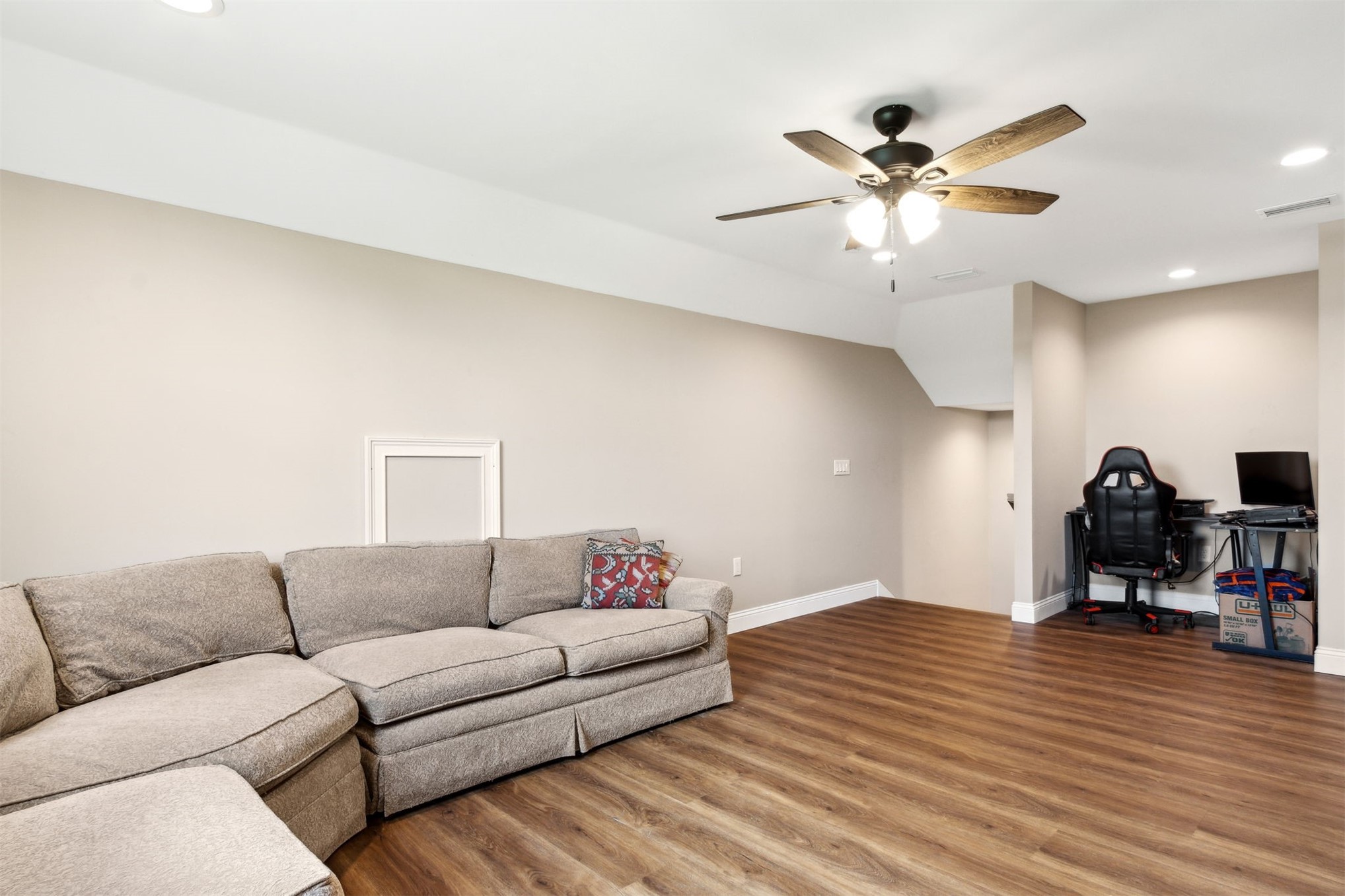 37854 Kings Ferry Road Hilliard, FL 32046 - Photo 42 of 52 a living room with furniture and a wooden floor