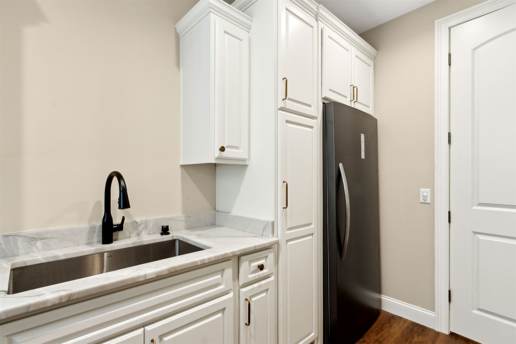 37854 Kings Ferry Road Hilliard, FL 32046 - Photo 45 of 52 a kitchen with stainless steel appliances a refrigerator and sink