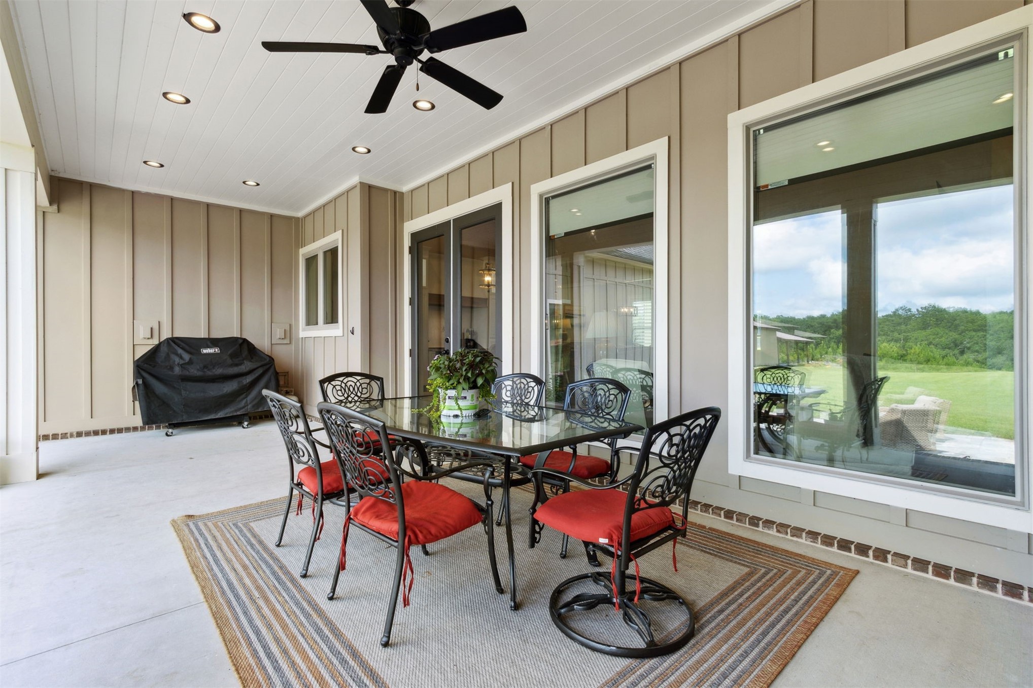 37854 Kings Ferry Road Hilliard, FL 32046 - Photo 47 of 52 a living room with furniture a window and a rug