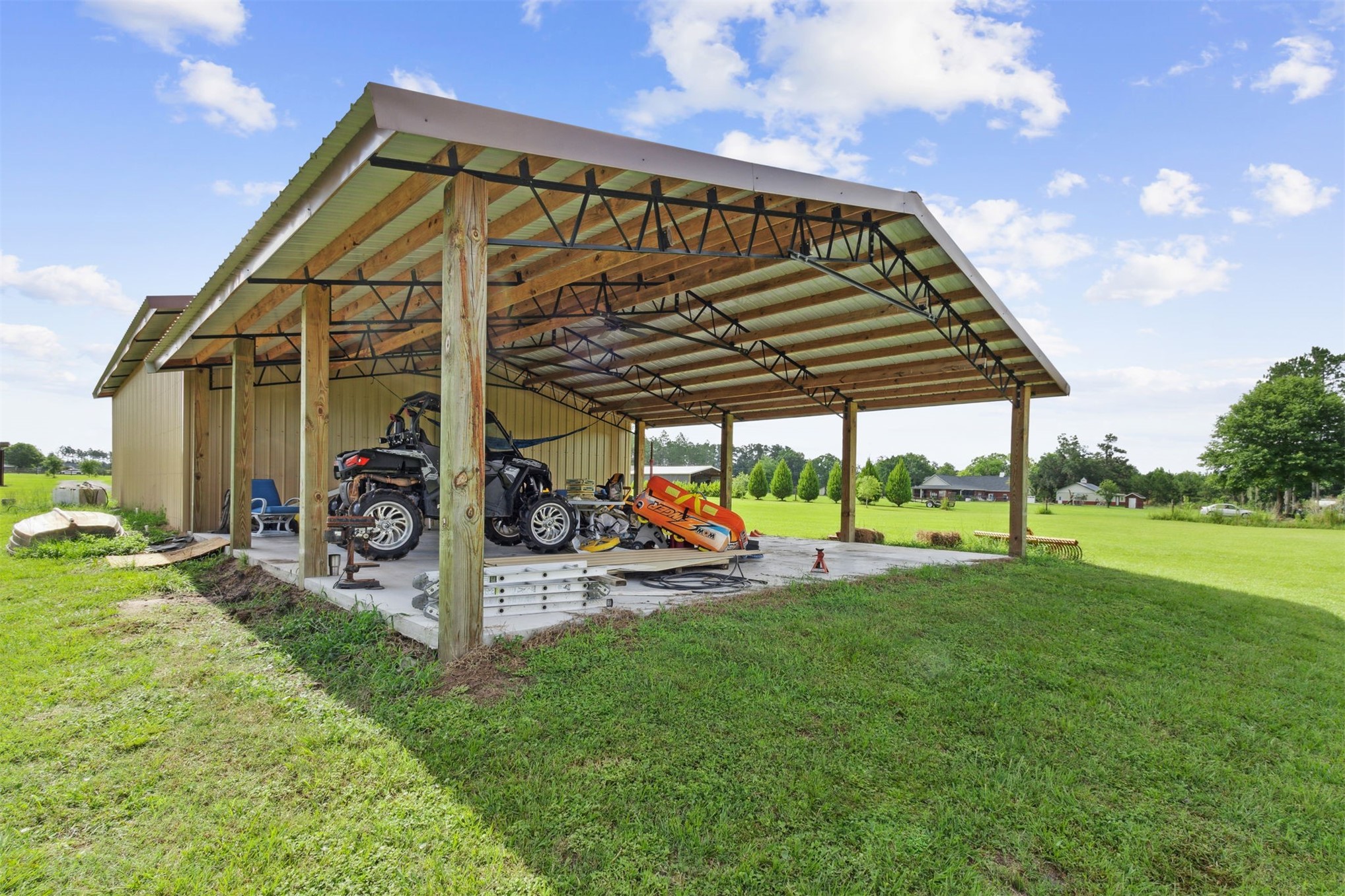 37854 Kings Ferry Road Hilliard, FL 32046 - Photo 49 of 52 a view of a chair and table in the yard