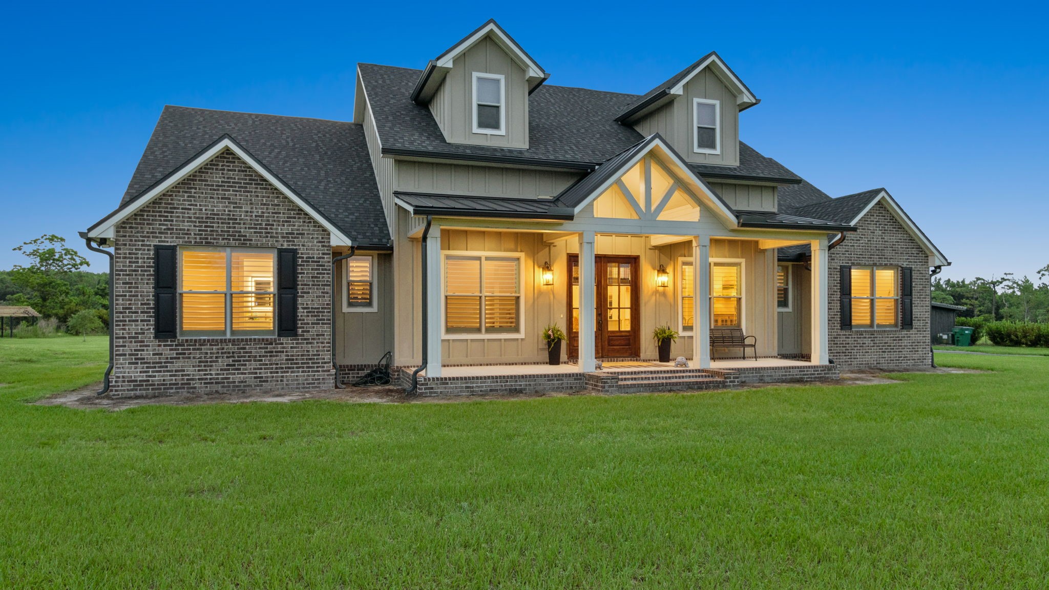 37854 Kings Ferry Road Hilliard, FL 32046 - Photo 7 of 52 a front view of a house with garden