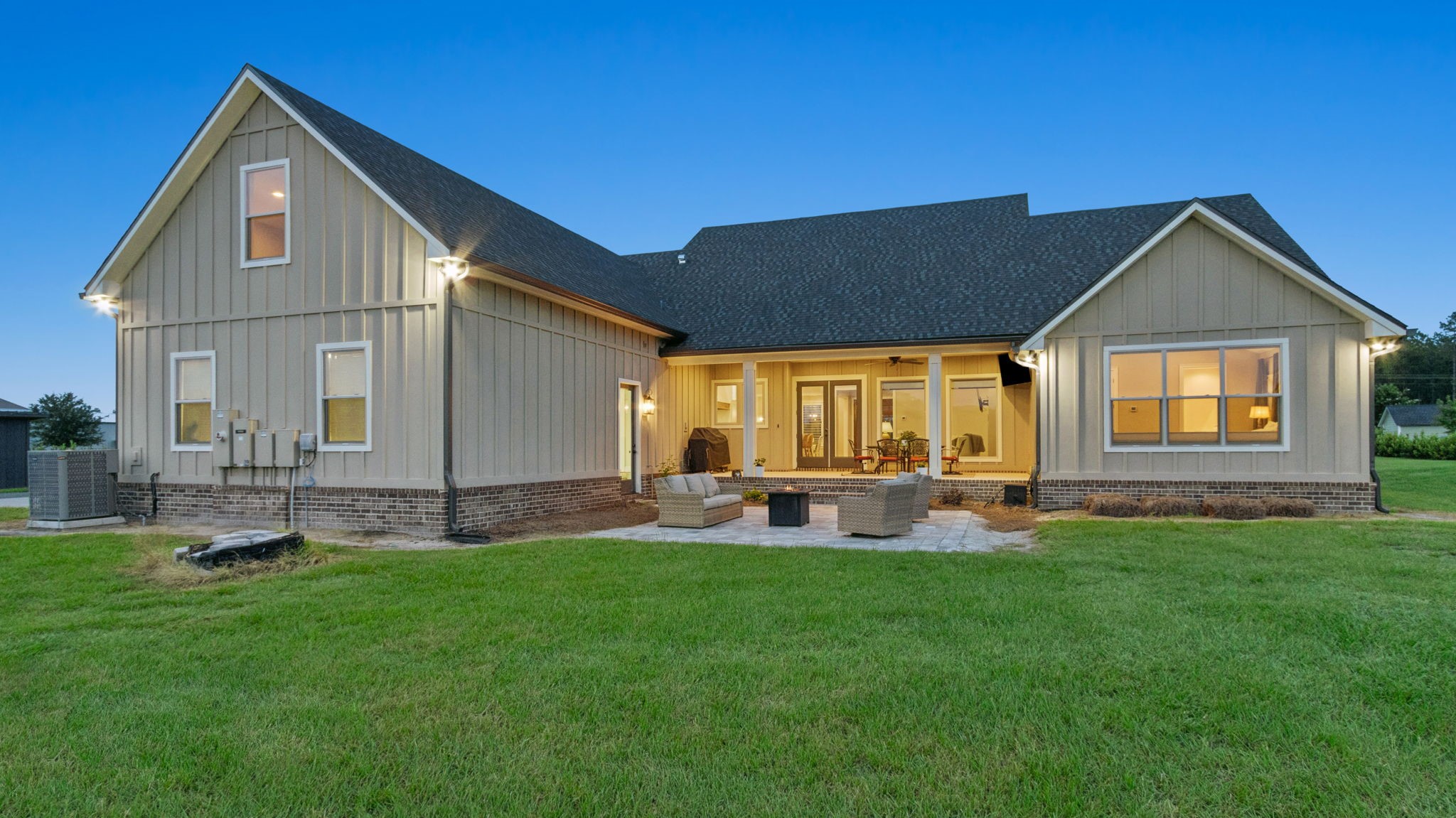 37854 Kings Ferry Road Hilliard, FL 32046 - Photo 10 of 52 a front view of house with yard and outdoor seating