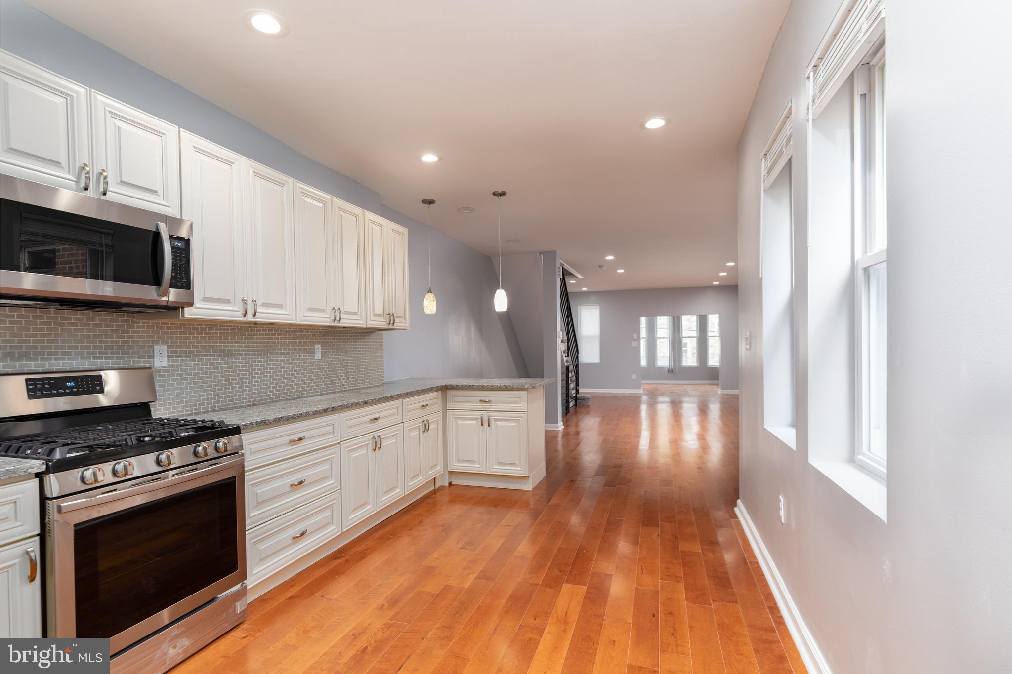 5136 Gainor Road Philadelphia, PA 19131 - Photo 3 of 28 Kitchen to living area