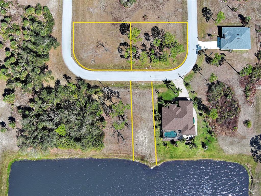 9 Mate Circle Placida, FL 33946 - Photo 6 of 7 view of a fireplace with a tree in the background