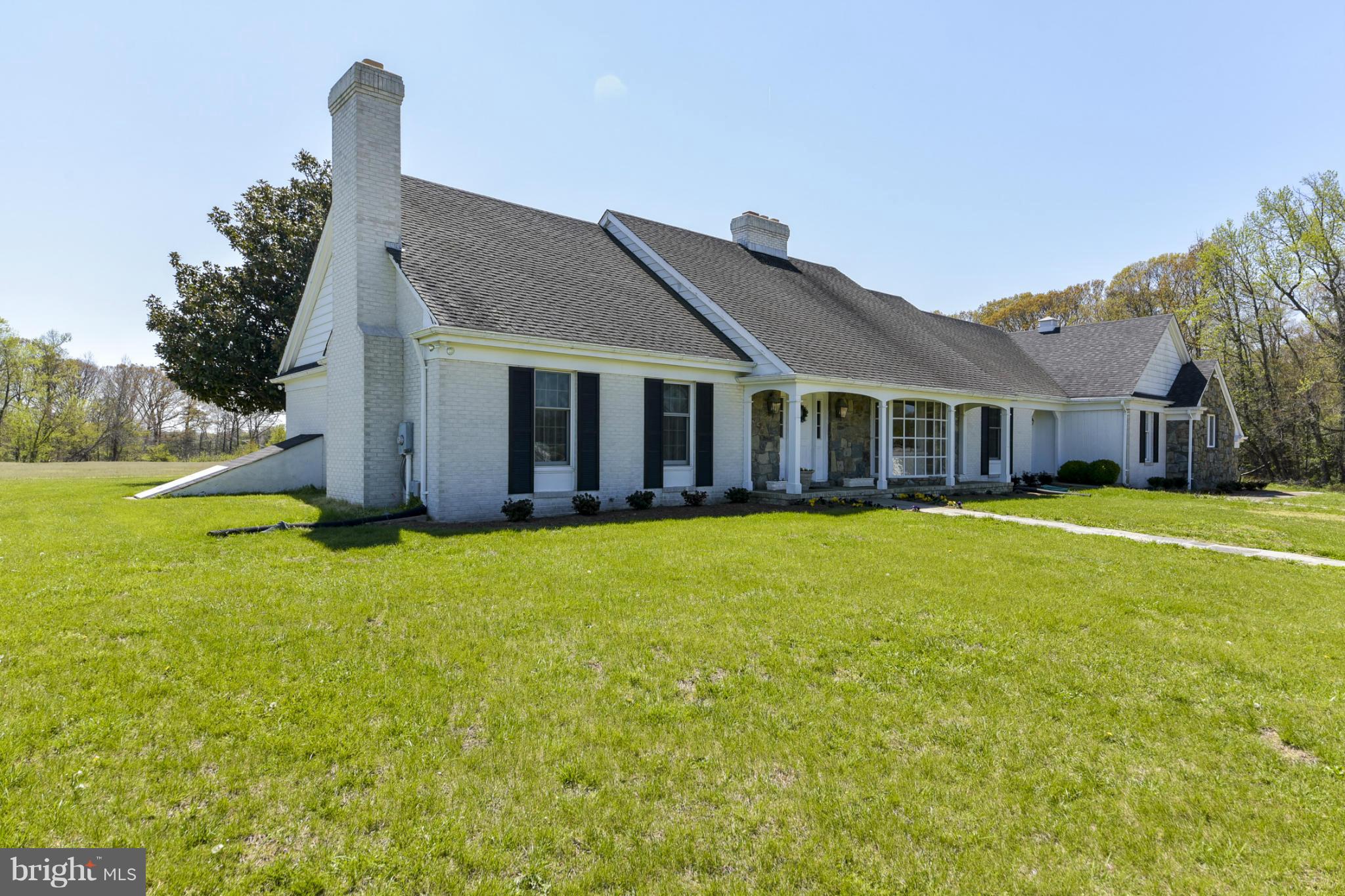 1901 Lowery Road Huntingtown, MD 20639 - Photo 1 of 30 a view of a house with a swimming pool