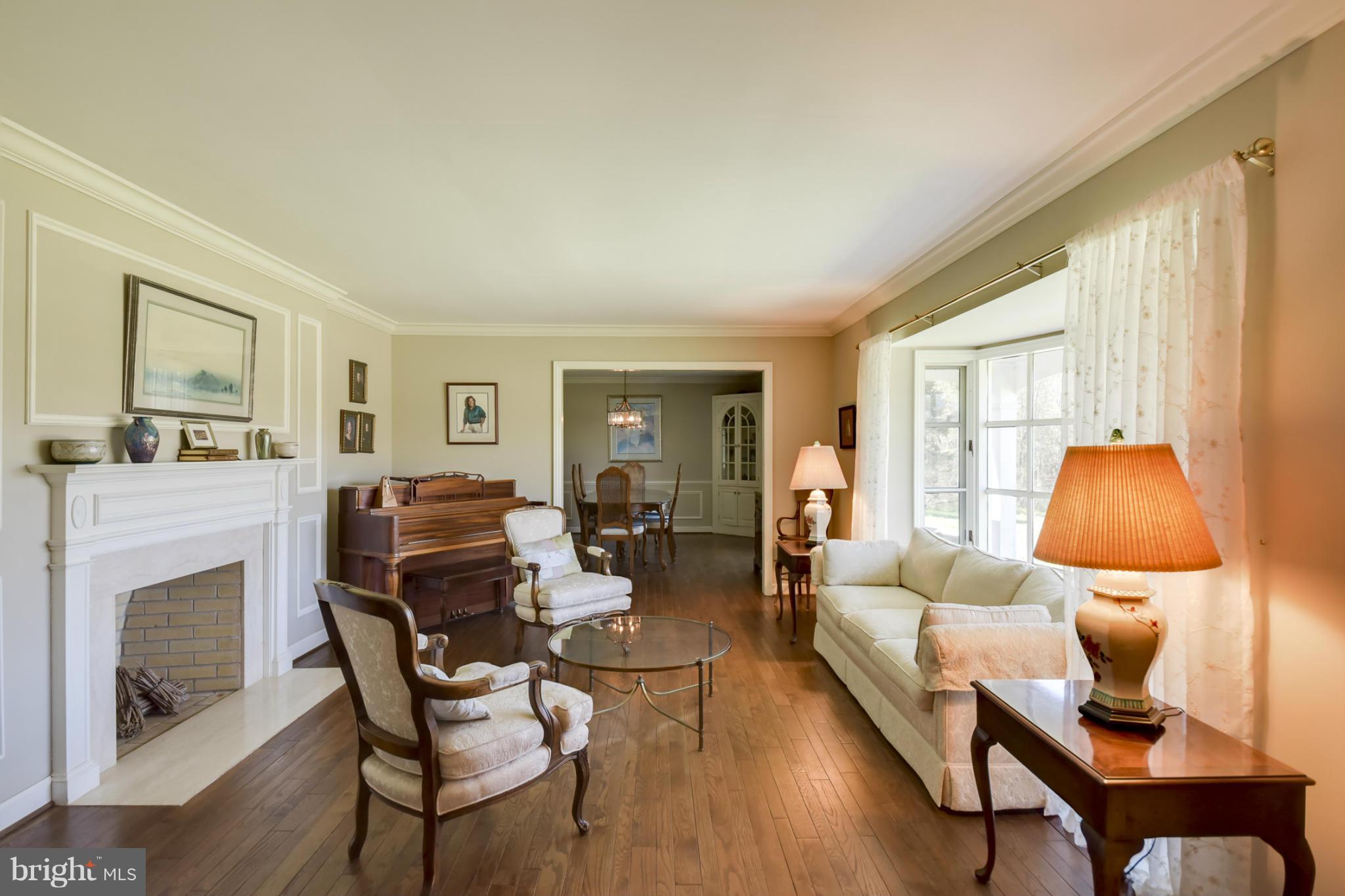 1901 Lowery Road Huntingtown, MD 20639 - Photo 5 of 30 a living room with furniture and a fireplace