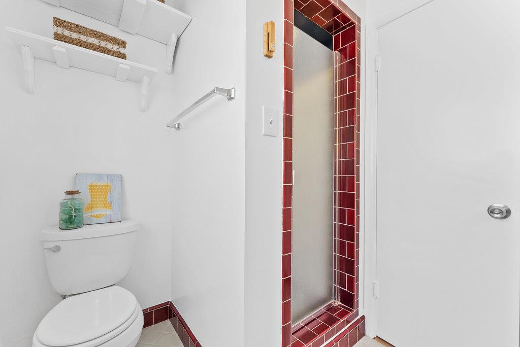 403 Beach Drive Aptos, CA 95003 - Photo 13 of 24 a bathroom with a toilet and a shower