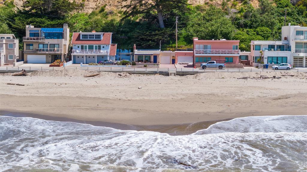 403 Beach Drive Aptos, CA 95003 - Photo 22 of 24 a table and chairs sitting in the middle of a yard