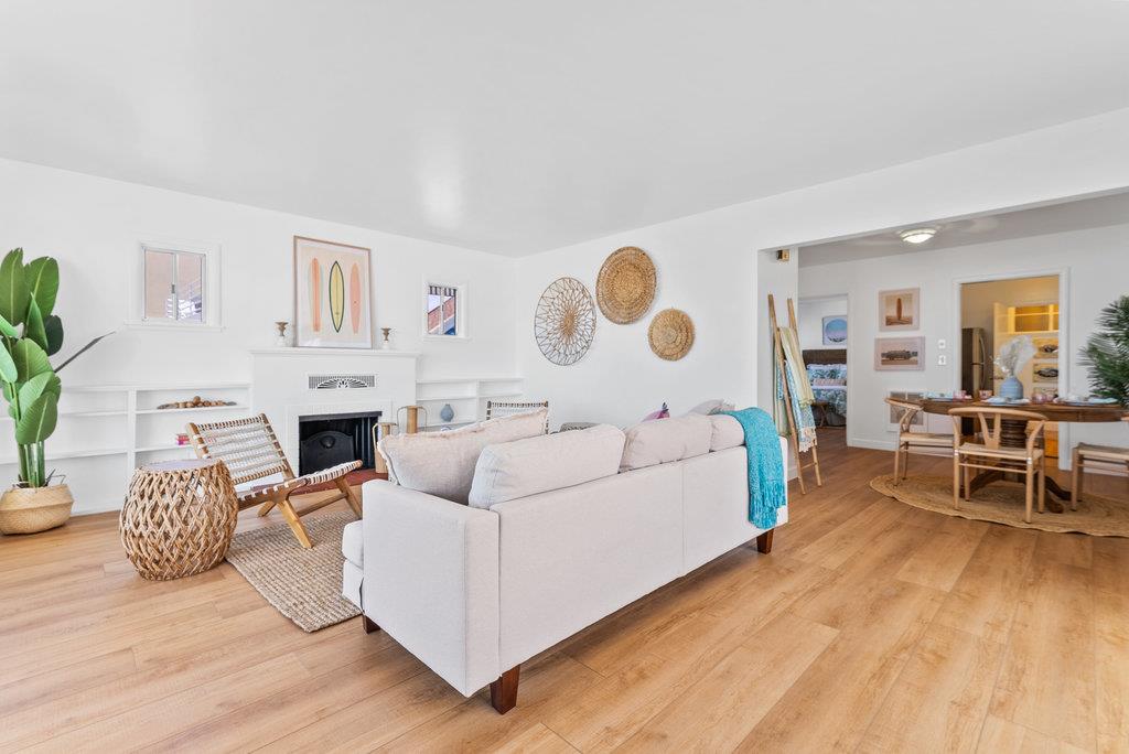 403 Beach Drive Aptos, CA 95003 - Photo 3 of 24 a living room with furniture and a fireplace