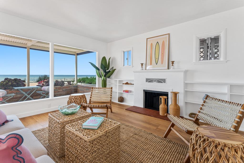 403 Beach Drive Aptos, CA 95003 - Photo 4 of 24 a living room with furniture and a fireplace