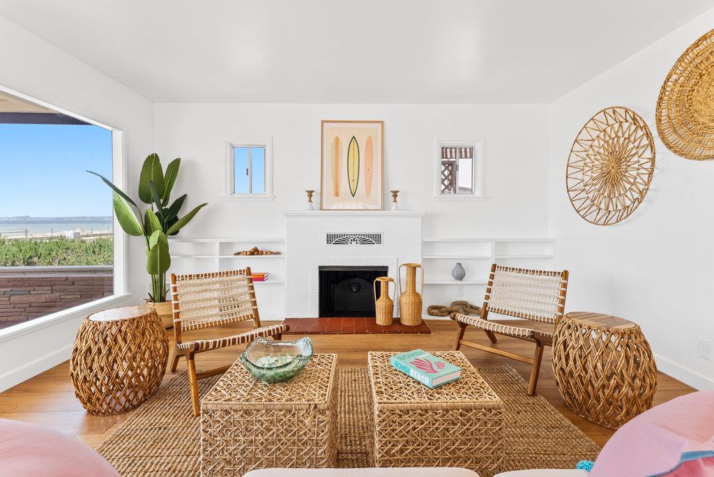 403 Beach Drive Aptos, CA 95003 - Photo 5 of 24 a living room with furniture and a fireplace