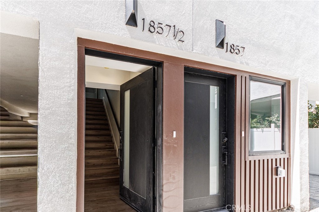 1857 Crenshaw Boulevard, Unit 1/2 Los Angeles, CA 90019 - Photo 7 of 24 a view of a hallway with entryway front of a house