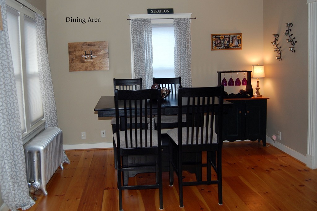 105 Gresham Street Springfield, MA 01119 - Photo 13 of 30 a view of a dining room with furniture and wooden floor