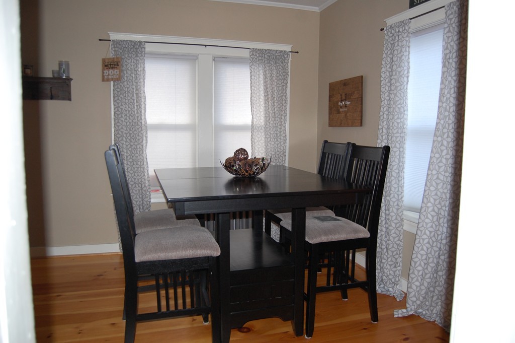 105 Gresham Street Springfield, MA 01119 - Photo 15 of 30 a view of a dining room with furniture and window