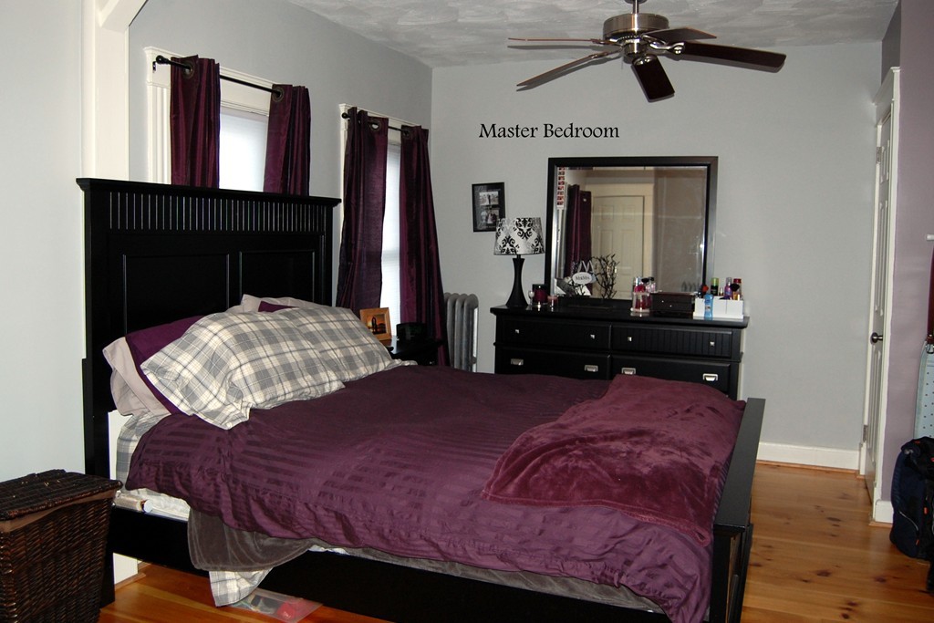 105 Gresham Street Springfield, MA 01119 - Photo 19 of 30 a bedroom with a bed and dresser