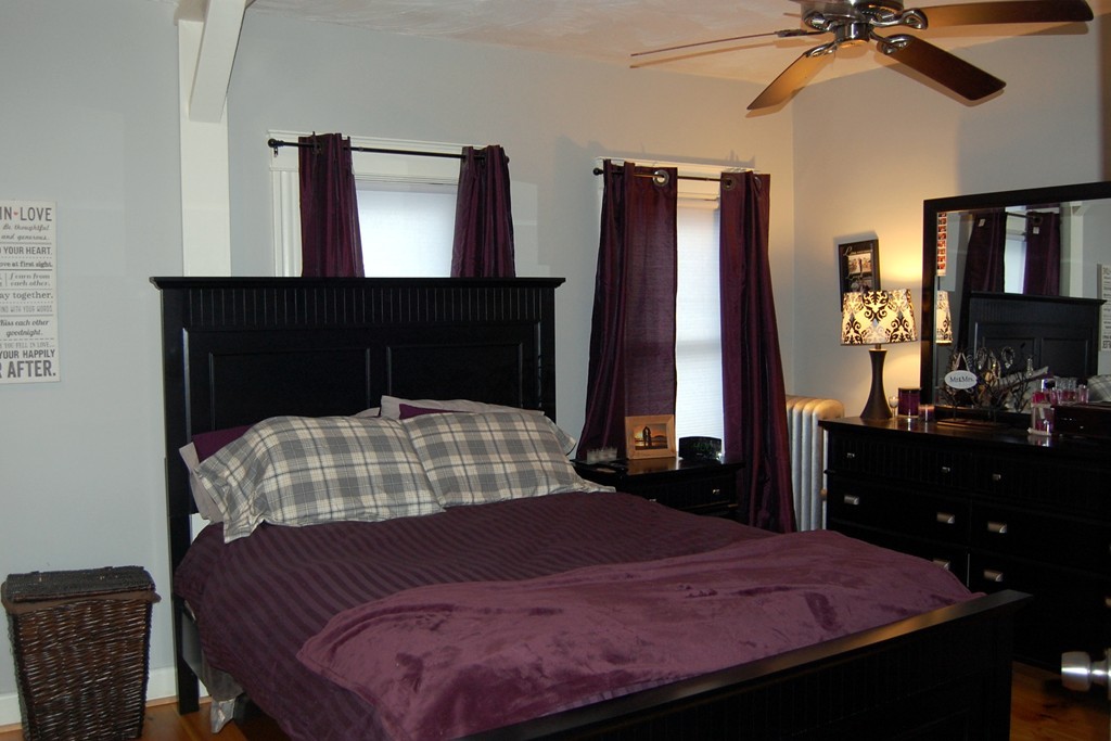 105 Gresham Street Springfield, MA 01119 - Photo 22 of 30 a bedroom with a bed and a dresser