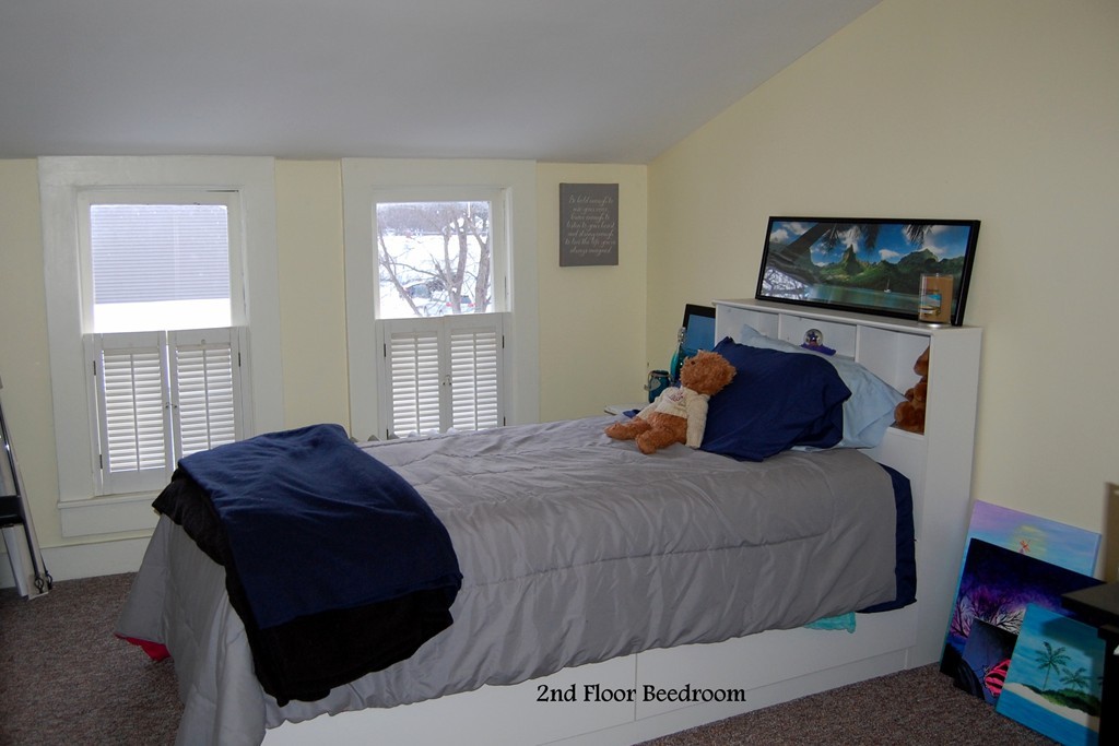 105 Gresham Street Springfield, MA 01119 - Photo 23 of 30 a bedroom with a bed and a window
