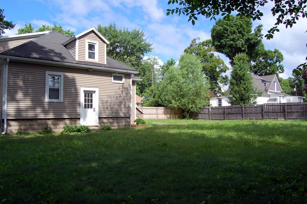 105 Gresham Street Springfield, MA 01119 - Photo 3 of 30 a front view of house with yard and green space