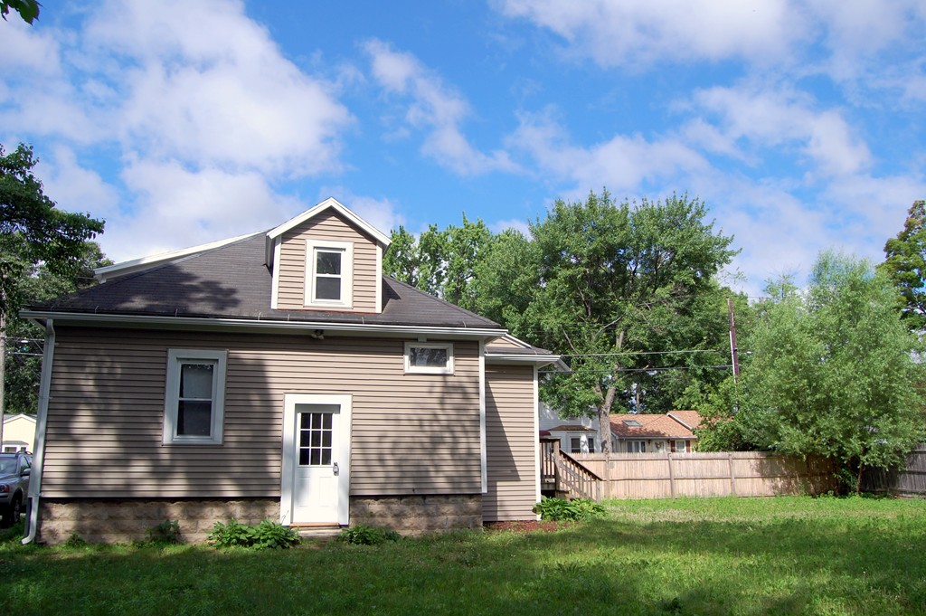 105 Gresham Street Springfield, MA 01119 - Photo 4 of 30 a view of a house with a yard