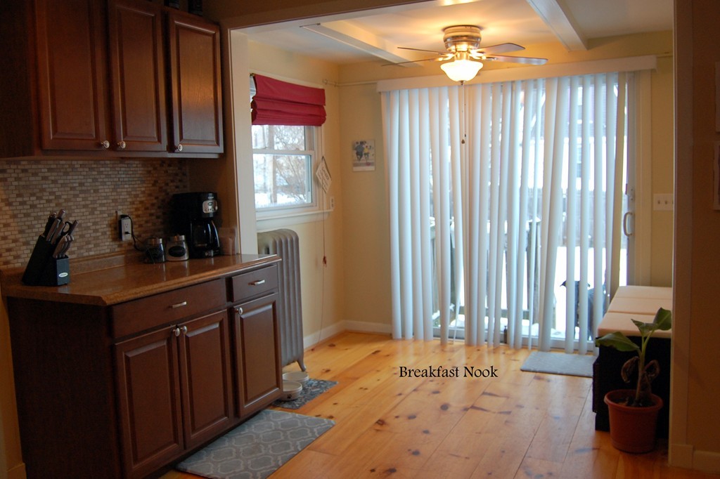 105 Gresham Street Springfield, MA 01119 - Photo 9 of 30 a kitchen with a sink and cabinets