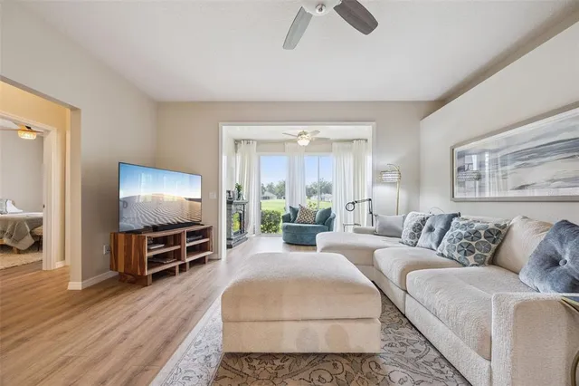 a bathroom with a tub sink and a mirror