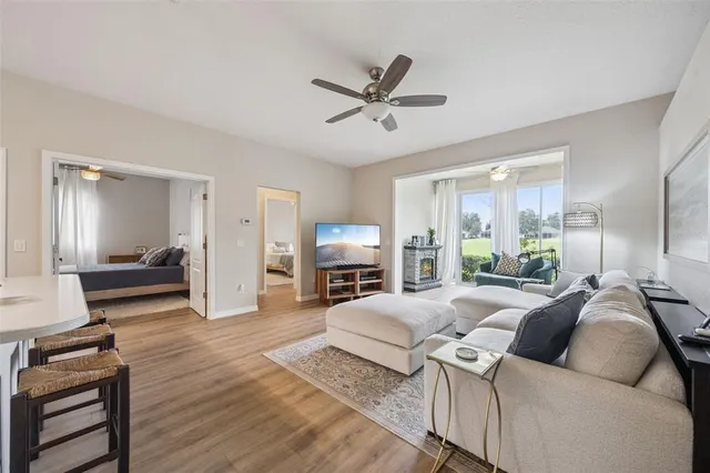 a spacious bedroom with a bed and a couch