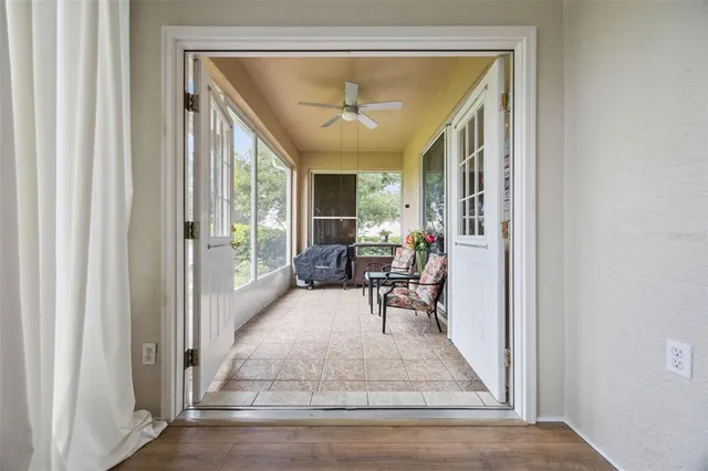 an aerial view of a house with yard