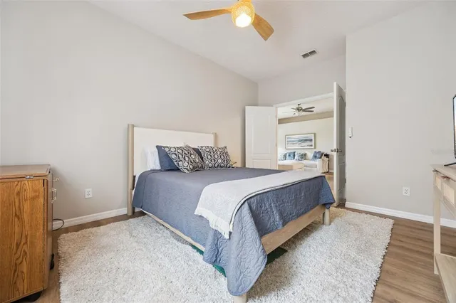 a view of a swimming pool with an outdoor space and seating area