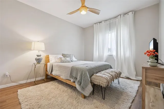 an aerial view of a house with garden space and outdoor seating