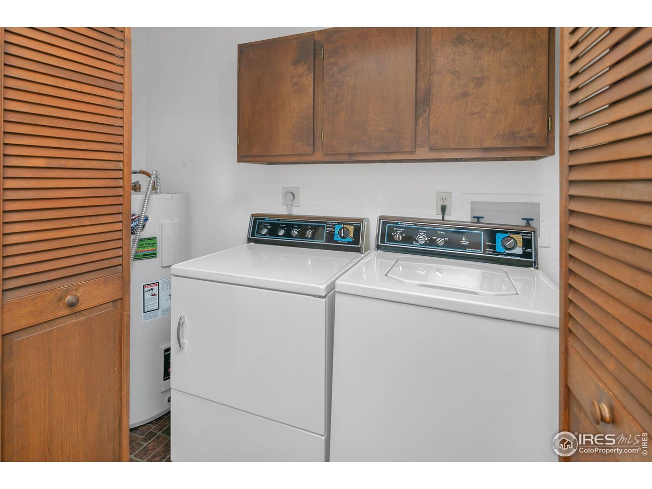 1052 Streamside Drive Drake, CO 80515 - Photo 10 of 31 a utility room with dryer and washer